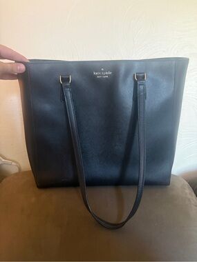 Kate Spade black leather tote with gold accents